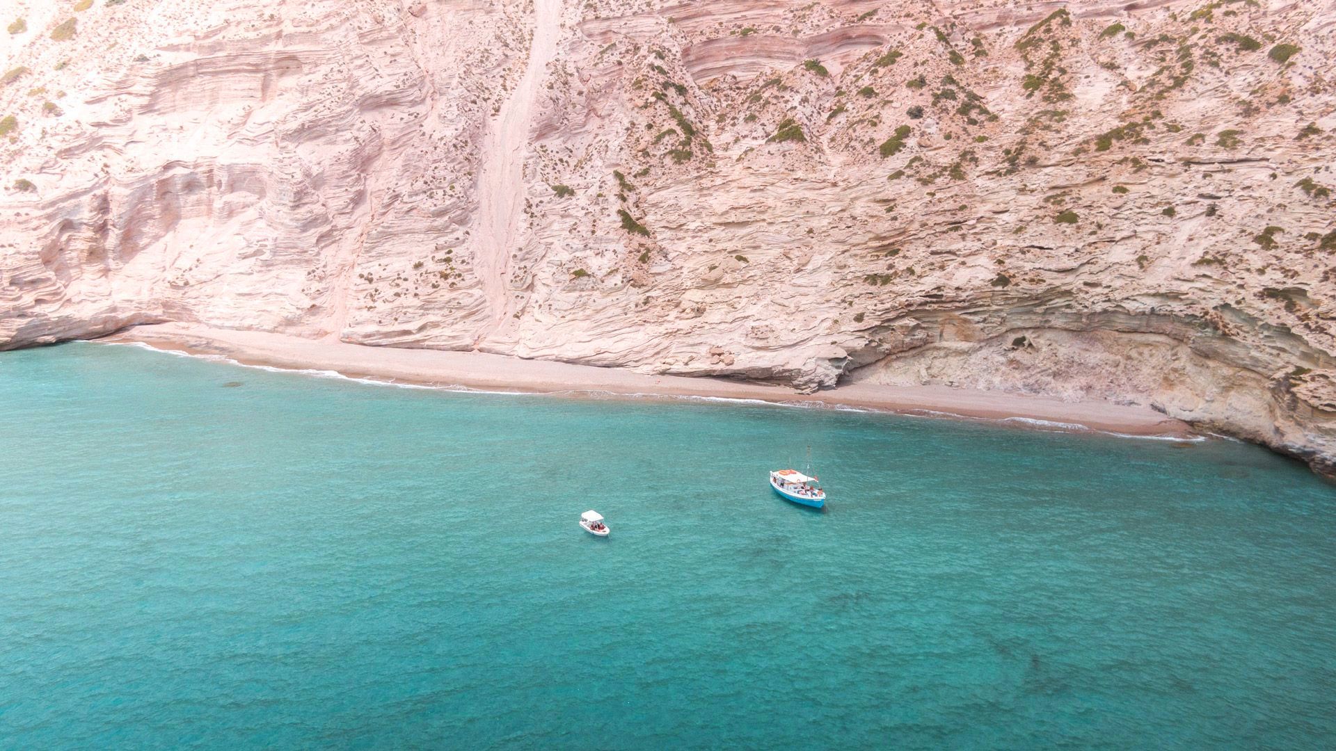 Milos Private Boat Cruise to Sykia, Kleftiko, Tsigrado & Gerakas. Get to know the most beautiful beaches of Milos in a full-day cruise!